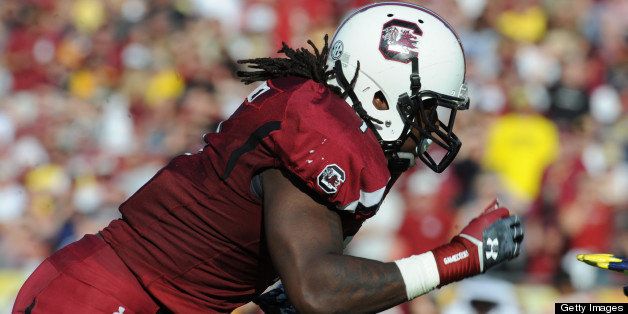 TAMPA, FL - JANUARY 01: Defensive end Jadeveon Clowney #7 of the South Carolina Gamecocks rushes up field during a 33 - 28 victory against the Michigan Wolverines in the Outback Bowl January 1, 2013 at Raymond James Stadium in Tampa, Florida. (Photo by Al Messerschmidt/Getty Images)