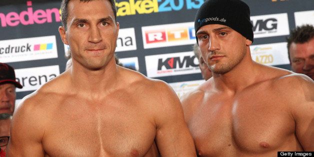 Ukrainian Heavyweight Champion Wladimir Klitschko (L) and challenger Italian- born Francesco Pianeta pose for photographers at the official weigh in on the eve of their title fight on May 4, 2013 in Heidelberg, Germany, on May 3, 2013. The 37-year-old Klitschko will defend his WBA, WBO, IBF and IBO belts in Mannheim, south-west Germany, against German-Italian Pianeta who survived testicular cancer three years ago and has a record of 28 wins and one draw. AFP PHOTO / DANIEL ROLAND (Photo credit should read DANIEL ROLAND/AFP/Getty Images)
