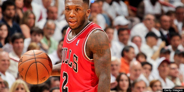 MIAMI, FL - MAY 6: Nate Robinson #2 of the Chicago Bulls controls the ball against the Miami Heat in Game One of the Eastern Conference Semifinals during the 2013 NBA Playoffs on May 6, 2013 at American Airlines Arena in Miami, Florida. NOTE TO USER: User expressly acknowledges and agrees that, by downloading and/or using this photograph, user is consenting to the terms and conditions of the Getty Images License Agreement. Mandatory copyright notice: Copyright NBAE 2013 (Photo by Issac Baldizon/NBAE via Getty Images)