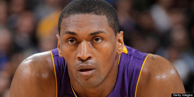 OAKLAND, CA - MARCH 25: Metta World Peace #15 of the Los Angeles Lakers in a game against the Golden State Warriors on March 25, 2013 at Oracle Arena in Oakland, California. NOTE TO USER: User expressly acknowledges and agrees that, by downloading and or using this photograph, user is consenting to the terms and conditions of Getty Images License Agreement. Mandatory Copyright Notice: Copyright 2013 NBAE (Photo by Rocky Widner/NBAE via Getty Images)