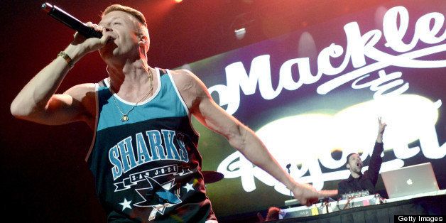 SAN JOSE, CA - MAY 9: Macklemore (L) and Ryan Lewis of Macklemore & Ryan Lewis perform as part of Wild 94.9's Wild Jam at HP Pavilion on May 9, 2013 in San Jose, California. (Photo by Tim Mosenfelder/Getty Images)
