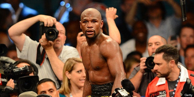 LAS VEGAS, NV - MAY 04: Floyd Mayweather Jr. celebrates his unanimous decision victory against Robert Guerrero in their WBC