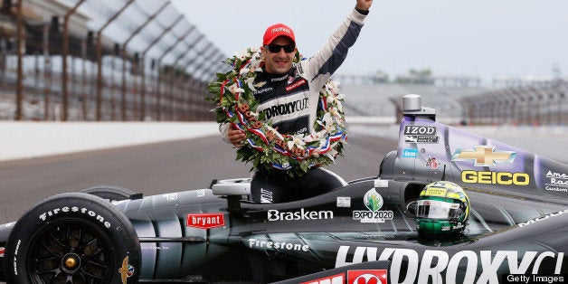 INDIANAPOLIS, IN - MAY 27: 2013 Indianapolis 500 Champion Tony Kanaan of Brazil, driver of the Hydroxycut KV Racing Technology-SH Racing Chevrolet, sits in his car as he poses at the yard of bricks during the Indianapolis 500 Mile Race Trophy Presentation and Champions Portrait Session at Indianapolis Motor Speedway on May 27, 2013 in Indianapolis, Indiana. Kanaan earned his first Indy 500 victory by winning the 97th running of the race. (Photo by Chris Graythen/Getty Images)