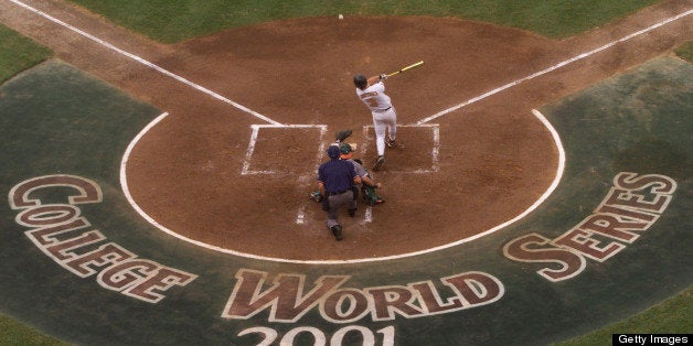 14 Jun 2001: A Tennessee player hits the ball against Miami at the College World Series at Rosenblatt Stadium in Omaha, Nebraska. DIGITAL IMAGE Mandatory Credit: Andy Lyons/ALLSPORT