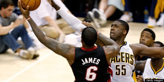 INDIANAPOLIS, IN - MAY 26: LeBron James #6 of the Miami Heat goes up against Roy Hibbert #55 of the Indiana Pacers during Game Three of the Eastern Conference Finals at Bankers Life Fieldhouse on May 26, 2013 in Indianapolis, Indiana. NOTE TO USER: User expressly acknowledges and agrees that, by downloading and or using this photograph, user is consenting to the terms and conditions of the Getty Images License Agreement. (Photo by Gregory Shamus/Getty Images)