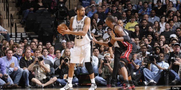 SAN ANTONIO, TX - MARCH 4: San Antonio Spurs center Tim Duncan #21 protects the ball during the game against the Miami Heat at AT&T Center on March 4, 2011 in San Antonio, Texas. The Spurs won 125-95. NOTE TO USER: User expressly acknowledges and agrees that, by downloading and or using this photograph, user is consenting to the terms and conditions of the Getty Images License Agreement. Mandatory Copyright Notice: Copyright 2011 NBAE (Photos by D. Clarke Evans/NBAE via Getty Images) 