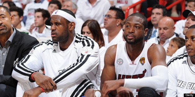 MIAMI, FL - JUNE 6: LeBron James #6 and Dwyane Wade #3 of the Miami Heat look on from the bench during Game One of the 2013 NBA Finals against the San Antonio Spurs on June 6, 2013 at American Airlines Arena in Miami, Florida. NOTE TO USER: User expressly acknowledges and agrees that, by downloading and or using this photograph, User is consenting to the terms and conditions of the Getty Images License Agreement. Mandatory Copyright Notice: Copyright 2013 NBAE (Photo by Andrew D. Bernstein/NBAE via Getty Images)