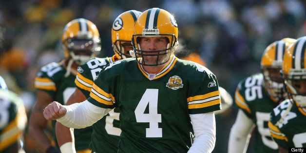 GREEN BAY, WI - DECEMBER 09: Brett Favre #4 of the Green Bay Packers runs onto the field with teammates during player introductions before a game against the Oakland Raiders on December 9, 2007 at Lambeau Field in Green Bay, Wisconsin. (Photo by Jonathan Daniel/Getty Images)