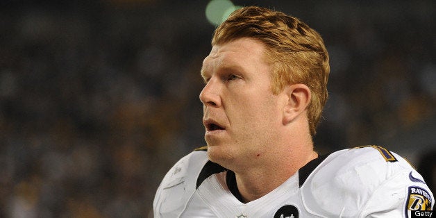 PITTSBURGH, PA - NOVEMBER 18: Center Matt Birk #77 of the Baltimore Ravens looks on from the sideline during a game against