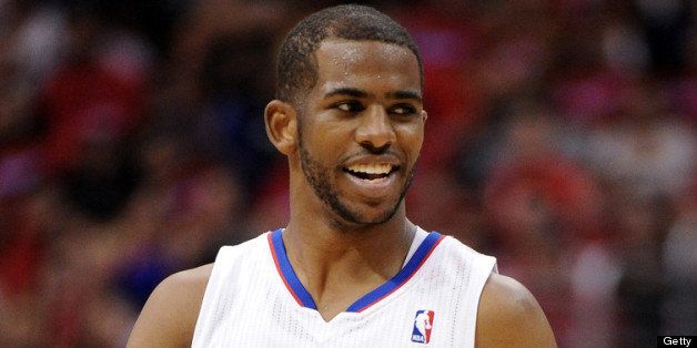 LOS ANGELES, CA - APRIL 20: Chris Paul #3 of the Los Angeles Clippers smiles during a 112-91 win over the Memphis Grizzlies during Game One of the Western Conference Quarterfinals of the 2013 NBA Playoffs at Staples Center on April 20, 2013 in Los Angeles, California. NOTE TO USER: User expressly acknowledges and agrees that, by downloading and or using this photograph, User is consenting to the terms and conditions of the Getty Images License Agreement. (Photo by Harry How/Getty Images)