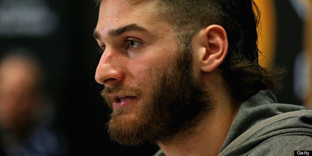 CHICAGO, IL - JUNE 11: Brandon Saad #20 of the Chicago Blackhawks answers questions during the 2013 NHL Stanley Cup media day at the United Center on June 11, 2013 in Chicago, Illinois. (Photo by Jonathan Daniel/Getty Images)