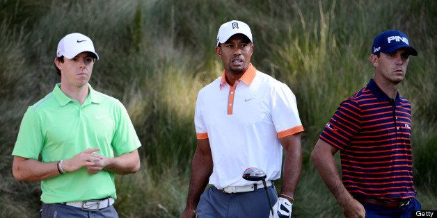 ARDMORE, PA - JUNE 12: (L-R) Rory McIlroy of Northern Ireland, Tiger Woods of the United States and Billy Horschel of the United States wait on a tee box during a practice round prior to the start of the 113th U.S. Open at Merion Golf Club on June 12, 2013 in Ardmore, Pennsylvania. (Photo by David Cannon/Getty Images)
