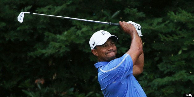 ARDMORE, PA - JUNE 13: Tiger Woods of the United States hits his tee shot on the 11th hole during Round One of the 113th U.S
