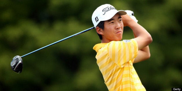 ARDMORE, PA - JUNE 11: Amateur Michael Kim of the United States hits a tee shot during a practice round prior to the start o