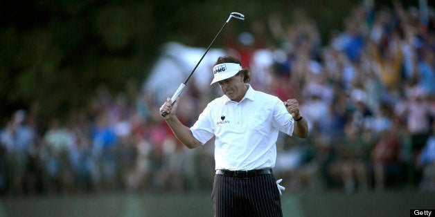 Phil Mickelson of United States reacts to his biddy putt on the 18th green finishing his second round of the US Open at Merion Golf Club June 14, 2013 in Ardmore, Pennsylvania. AFP PHOTO/Brendan SMIALOWSKI (Photo credit should read BRENDAN SMIALOWSKI/AFP/Getty Images)