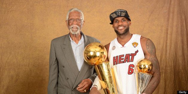 MIAMI, FL - JUNE 20: Hall of Famer Bill Russell and LeBron James #6 of the Miami Heat poses for a portrait with the Larry O'Brien and the Finals MVP Trophy after defeating the San Antonio Spurs in Game Seven of the 2013 NBA Finals on June 20, 2013 at American Airlines Arena in Miami, Florida. NOTE TO USER: User expressly acknowledges and agrees that, by downloading and or using this photograph, User is consenting to the terms and conditions of the Getty Images License Agreement. Mandatory Copyright Notice: Copyright 2013 NBAE (Photo by Andrew D. Bernstein/NBAE via Getty Images)