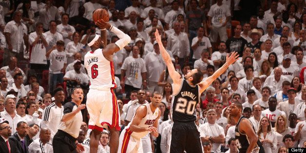 MIAMI, FL - JUNE 20: LeBron James #6 of the Miami Heat shoots against Manu Ginobili #20 of the San Antonio Spurs during Game Seven of the 2013 NBA Finals on June 20, 2013 at American Airlines Arena in Miami, Florida. NOTE TO USER: User expressly acknowledges and agrees that, by downloading and or using this photograph, User is consenting to the terms and conditions of the Getty Images License Agreement. Mandatory Copyright Notice: Copyright 2013 NBAE (Photo by Nathaniel S. Butler/NBAE via Getty Images)