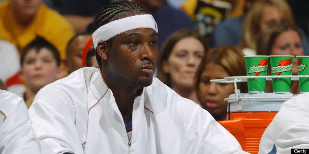 WASHINGTON - APRIL 9: Kwame Brown #5 of the Washington Wizards watches the game from the bench against the Philadelphia 76ers on April 9, 2005 at the MCI Center in Washington D.C. The 76ers won 112-106. NOTE TO USER: User expressly acknowledges and agrees that, by downloading and or using this photograph, User is consenting to the terms and conditions of the Getty Images License Agreement. Mandatory Copyright Notice: Copyright 2005 NBAE (Photo by Mitchell Layton/NBAE via Getty Images)