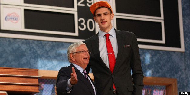 NEW YORK, NY - JUNE 27: Alex Len (R) of Maryland poses for a photo with NBA Commissioner David Stern after Len was drafted #5 overall in the first round by the Phoenix Suns during the 2013 NBA Draft at Barclays Center on June 27, 2013 in in the Brooklyn Bourough of New York City. NOTE TO USER: User expressly acknowledges and agrees that, by downloading and/or using this Photograph, user is consenting to the terms and conditions of the Getty Images License Agreement. (Photo by Mike Stobe/Getty Images)