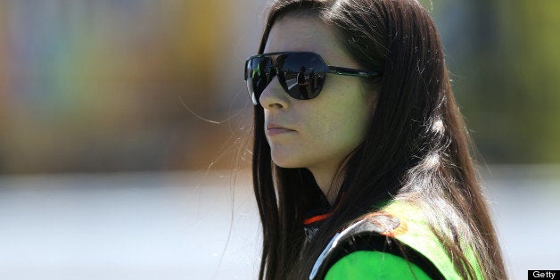 SONOMA, CA - JUNE 22: Danica Patrick, driver of the #10 GoDaddy.com Chevrolet, stands on pit road during qualifying for the