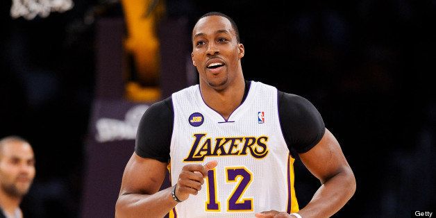 LOS ANGELES, CA - APRIL 28: Dwight Howard #12 of the Los Angeles Lakers smiles while playing the San Antonio Spurs in Game Four of the Western Conference Quarterfinals during the 2013 NBA Playoffs at Staples Center on April 28, 2013 in Los Angeles, California. NOTE TO USER: User expressly acknowledges and agrees that, by downloading and/or using this Photograph, user is consenting to the terms and conditions of the Getty Images License Agreement. Mandatory Copyright Notice: Copyright 2013 NBAE (Photo by Noah Graham/NBAE via Getty Images)