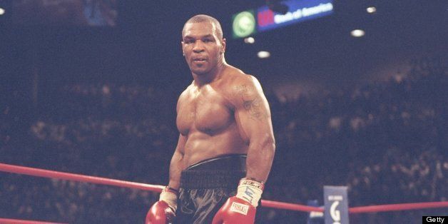 28 Jun 1997: Mike Tyson looks on during a bout against Evander Holyfield at the MGM Grand Garden in Las Vegas, Nevada. Holyfield won the fight with a disqualification in the third round.