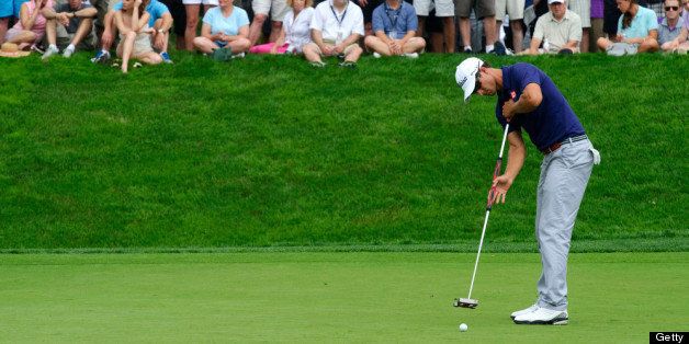 BETHESDA, MD - JUNE 27: Adam Scott putts the ball at the seventh hole of the Congressional Country Club golf course during the AT&T National Golf Tournament in Bethesda, MD, on June 27, 2013. Scott won the Masters tournament earlier this year. (Photo by Maddie Meyer/The Washington Post via Getty Images)