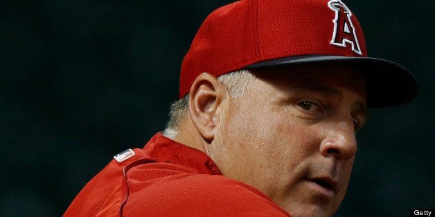 HOUSTON, TX - MAY 09: Manager Mike Scioscia of the Los Angeles Angels of Anaheim waits near the batting cage before the start of the game against the Houston Astros at Minute Maid Park on May 9, 2013 in Houston, Texas. (Photo by Scott Halleran/Getty Images)