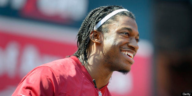 LANDOVER MD - APRIL 27: Washington Redskins quarterback Robert Griffin III speaks at the Redskins Fan Feast at FedEx field in Landover MD, April 27, 2013. (Photo by John McDonnell/The Washington Post via Getty Images)