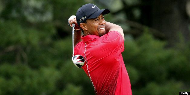 ARDMORE, PA - JUNE 16: Tiger Woods of the United States hits his tee shot on the third hole during the final round of the 113th U.S. Open at Merion Golf Club on June 16, 2013 in Ardmore, Pennsylvania. (Photo by Rob Carr/Getty Images)