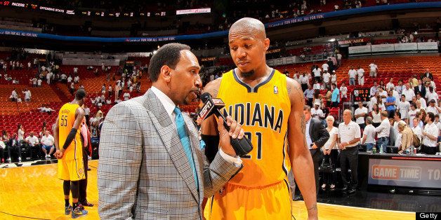 MIAMI, FL - MAY 24: David West #21 of the Indiana Pacers is interviewed by ESPN analyst Stephen A. Smith following the Pacers victory against the Miami Heat in Game Two of the Eastern Conference Finals during the 2013 NBA Playoffs on May 24, 2013 at American Airlines Arena in Miami, Florida. NOTE TO USER: User expressly acknowledges and agrees that, by downloading and/or using this photograph, user is consenting to the terms and conditions of the Getty Images License Agreement. Mandatory copyright notice: Copyright NBAE 2013 (Photo by Issac Baldizon/NBAE via Getty Images)