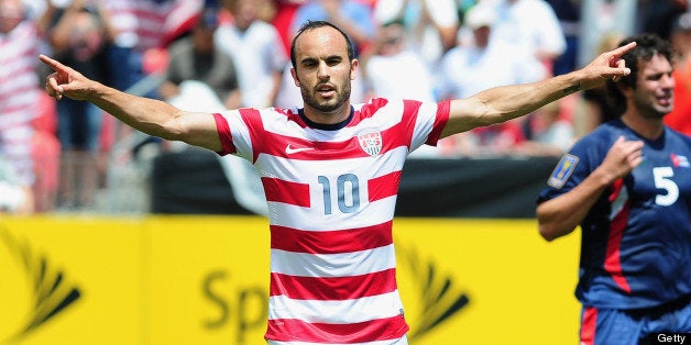 Landon Donovan of the US celebrates his first half equalizer after scoring from the penalty spot against Cuba during their CO