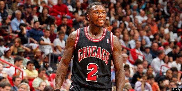MIAMI, FL - JANUARY 4: Nate Robinson #2 of the Chicago Bulls smiles while playing against the Miami Heat on January 4, 2013 at American Airlines Arena in Miami, Florida. NOTE TO USER: User expressly acknowledges and agrees that, by downloading and/or using this photograph, user is consenting to the terms and conditions of the Getty Images License Agreement. Mandatory copyright notice: Copyright NBAE 2013 (Photo by Issac Baldizon/NBAE via Getty Images)