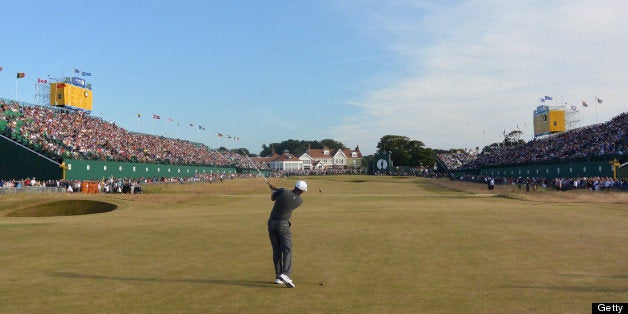 GULLANE, SCOTLAND - JULY 20: Tiger Woods of the United States plays his second shot on the 18th hole during the third round