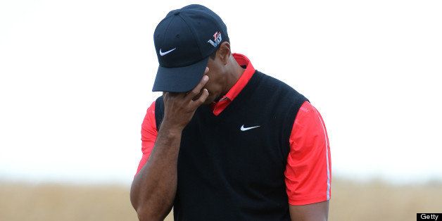 GULLANE, SCOTLAND - JULY 21: Tiger Woods of the United States reacts to a shot out of the rough during the final round of the 142nd Open Championship at Muirfield on July 21, 2013 in Gullane, Scotland. (Photo by Ian Walton/R&A/R&A via Getty Images)