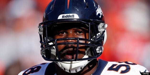 KANSAS CITY, MO - NOVEMBER 25: Outside linebacker Von Miller #58 of the Denver Broncos walks onto the field during player warm-ups prior to the game against the Kansas City Chiefs at Arrowhead Stadium on November 25, 2012 in Kansas City, Missouri. (Photo by Jamie Squire/Getty Images) 