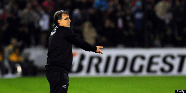 ROSARIO, ARGENTINA - MAY 29: Gerardo Martino, coach of Newell's Old Boys looks on during a match between Newell´s Old Boys and Boca Juniors as part of Quarter Finals of the Copa Bridgestone Libertadores at Marcelo Bielsa stadium on May 29, 2013 in Rosario, Argentina. (Photo by Sebastian Granata/LatinContent/Getty Images)