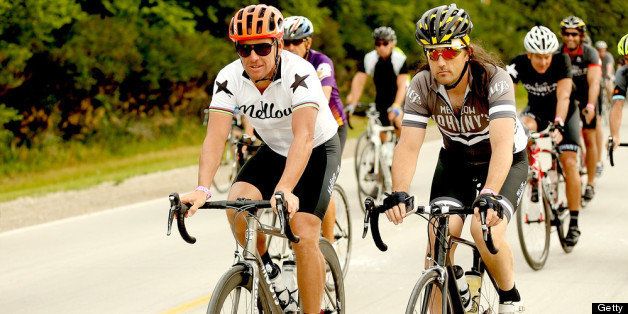 PERRY, IA - JULY 23: Lance Armstrong departs at the start of the third day of the RAGBRAI en route to West Des Moines on July 23, 2013 in Perry, Iowa. (Photo by Matthew Stockman/Getty Images)