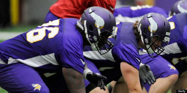EDEN PRAIRIE, MN - MAY 3: Travis Bond #76 and Jeff Baca #60 of the Minnesota Vikings line up to run a drill during a rookie minicamp on May 3, 2012 at Winter Park in Eden Prairie, Minnesota. (Photo by Hannah Foslien/Getty Images)