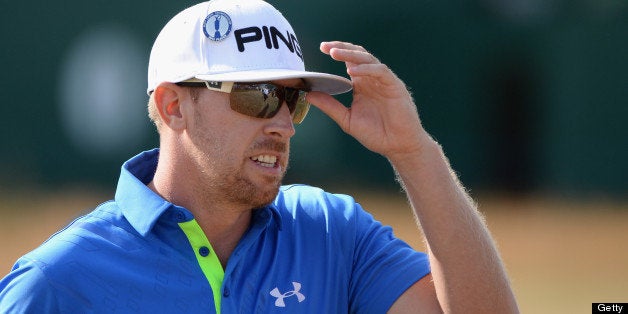 GULLANE, SCOTLAND - JULY 20: Hunter Mahan of the United States acknowledges the crowd on the 18th hole during the third roun