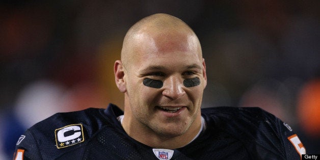 CHICAGO - NOVEMBER 25: Brian Urlacher #54 of the Chicago Bears smiles as the Bear offense moves down the field against the Denver Broncos in overtime on November 25, 2007 at Soldier Field in Chicago, Illinois. (Photo by Jonathan Daniel/Getty Images)