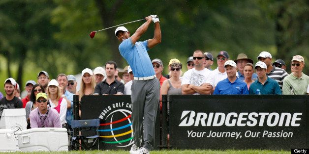 AKRON, OH - AUGUST 02: Tiger Woods hits off the third tee during the Second Round of the World Golf Championships-Bridgestone Invitational at Firestone Country Club South Course on August 2, 2013 in Akron, Ohio. (Photo by Gregory Shamus/Getty Images)