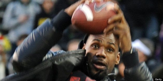 EUGENE, OR - NOVEMBER 19: LeBron James catches a ball on the sidelines before the game between the Oregon Ducks and the USC Trojans at Autzen Stadium on November 19, 2011 in Eugene, Oregon. (Photo by Steve Dykes/Getty Images)