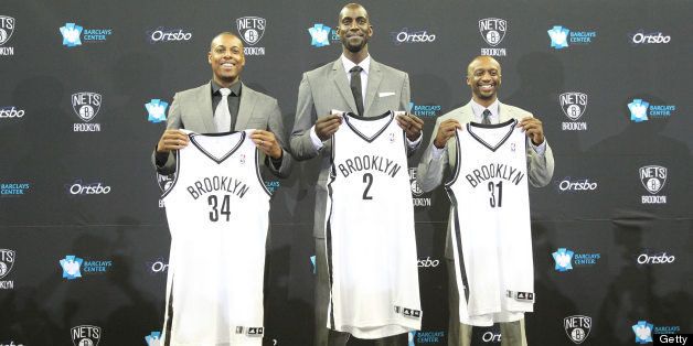 BROOKLYN, NY - July 18: Kevin Garnett #2, Paul Pierce #34, and Jason Terry #31 of the Brooklyn Nets pose with their new jerseys during a press conference at the Barclays Center on July 18, 2013 in the Brooklyn borough of New York City. NOTE TO USER: User expressly acknowledges and agrees that, by downloading and/or using this Photograph, user is consenting to the terms and conditions of the Getty Images License Agreement. Mandatory Copyright Notice: Copyright 2013 NBAE (Photo by Nathaniel S. Butler/NBAE via Getty Images)