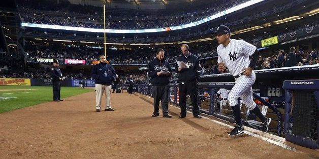 NEW YORK, NY - OCTOBER 13: (NEW YORK DAILIES OUT) Alex Rodriguez #13 of the New York Yankees is introduced before Game One of the American League Championship Series against the Detroit Tigers at Yankee Stadium on October 13, 2012 in the Bronx borough of New York City, New York.. The Tigers defeated the Yankees 6-4 in 12 innings. (Photo by Jim McIsaac/Getty Images) 