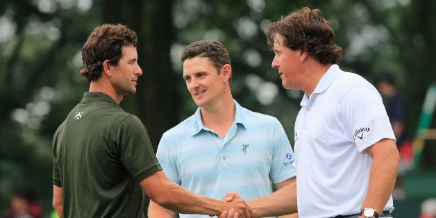 ROCHESTER, NY - AUGUST 09: (L-R) Adam Scott of Australia, Justin Rose of England and Phil Mickelson of the United States shake hands on the ninth green during the second round of the 95th PGA Championship on August 9, 2013 in Rochester, New York. (Photo by Sam Greenwood/Getty Images)