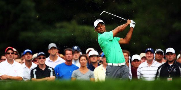 ROCHESTER, NY - AUGUST 09: Tiger Woods of the United States hits his tee shot on the sixth hole during the second round of the 95th PGA Championship on August 9, 2013 in Rochester, New York. (Photo by Streeter Lecka/Getty Images)