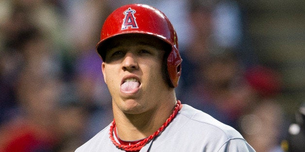 CLEVELAND, OH - AUGUST 9: Mike Trout #27 of the Los Angeles Angels of Anaheim reacts after striking out in the fifth inning