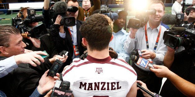 Texas A&M Aggies quarterback Johnny Manziel (2) answers questions from the media during the Cotton Bowl Media Day at Cowboys Stadium Sunday, December 30, 2012. (Richard W. Rodriguez/Fort Worth Star-Telegram/MCT via Getty Images)