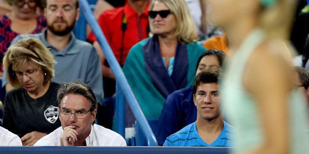 CINCINNATI, OH - AUGUST 13: Jimmy Connors coaches Maria Sharapova of Russia as she plays Sloane Stephens during the Western & Southern Open on August 13, 2013 at Lindner Family Tennis Center in Cincinnati, Ohio. (Photo by Matthew Stockman/Getty Images)